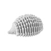 White hedgehog-shaped object on a white background