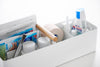 Close up of Yamazaki Home Slim Storage Box holding medical supplies