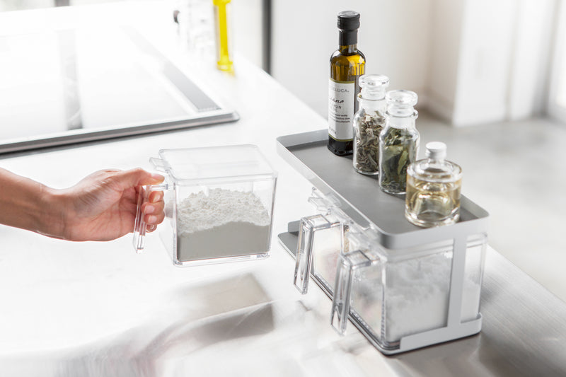 Aerial view of white Pantry Organizer holding cooking and baking ingredients in kitchen by Yamazaki Home.