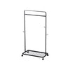 Black metal clothing rack on a white background