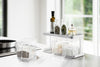 White Pantry Organizer with upper shelf holding spices and ingredients by Yamazaki Home.
