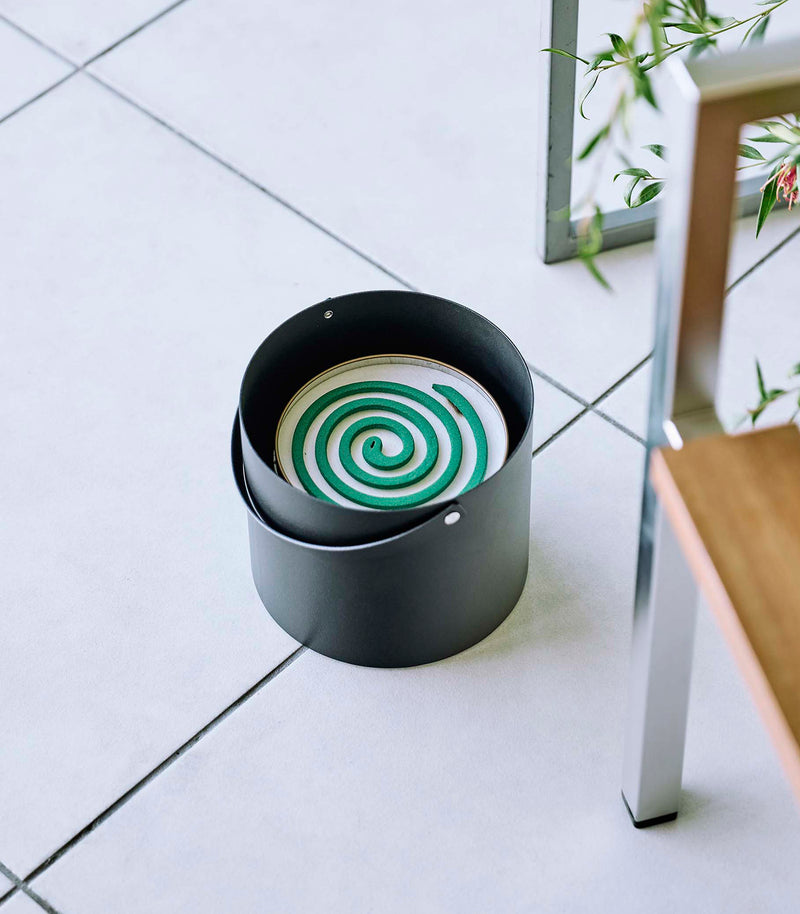 Yamazaki Mosquito Repellant Coil Holder opened with a coil inside