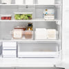 Front view of two Yamazaki Home Refrigerator Organizer Bin - Wide storing food