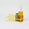 GIF of Yellow Pear Yamazaki Home Magnetic Storage Caddy being filled with oil and spices