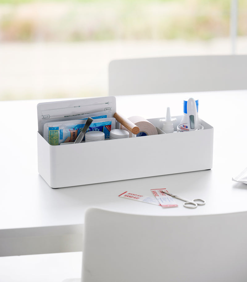 Yamazaki Home Slim Storage Box holding medical supplies