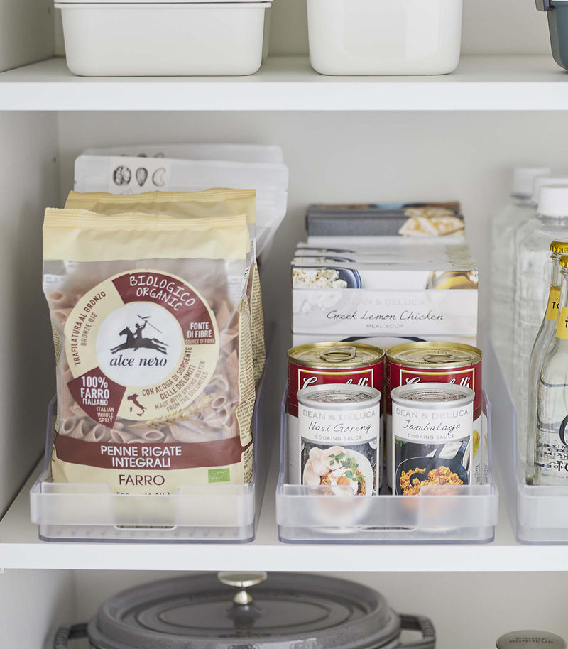 Close up of Yamazaki Refridgerator Organizer Bins on a shelf with food inside