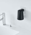 Black Yamazaki Home traceless adhesive magnetic cup installed next to sink
