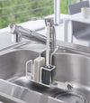 White Steel Yamazaki Home Faucet-Hanging Sponge & Brush Holder with a sponge and two brushes stored