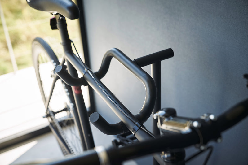 Close up top-down view of storage rungs on Yamazaki Home Bicycle Stand