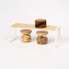 Yamazaki Home Single-Tier Riser with props, set against a white background.