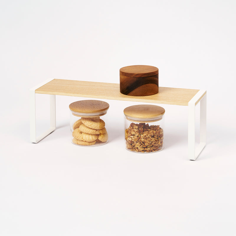 Yamazaki Home Single-Tier Riser with props, set against a white background.