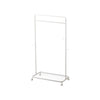 White metal clothing rack on a white background
