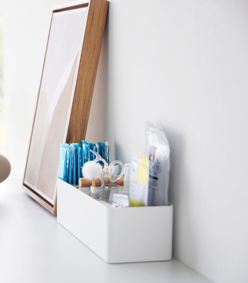Yamazaki Home Slim Storage Box holding medical supplies stored on a counter