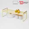 Countertop Wire Shelf with props on the white background, having a logo on the upper right.