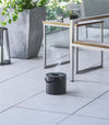 Black Yamazaki Mosquito Repellant Coil Holder and Storage Case outside on a patio