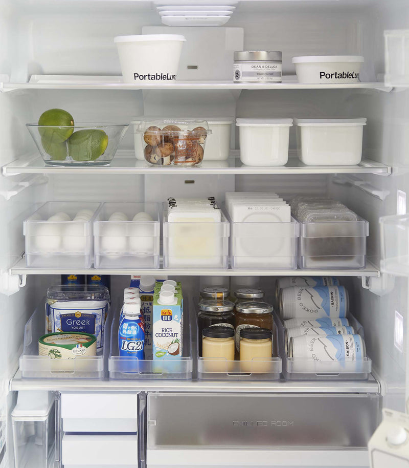 Full frontal view of Yamazaki Refridgerator Organizer Bins full of food inside a refridgerator