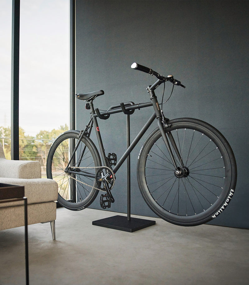 Yamazaki Home Bicycle Stand storing a bicycle