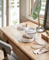 White Magnetic Organizer holding kitchen items by Yamazaki Home.