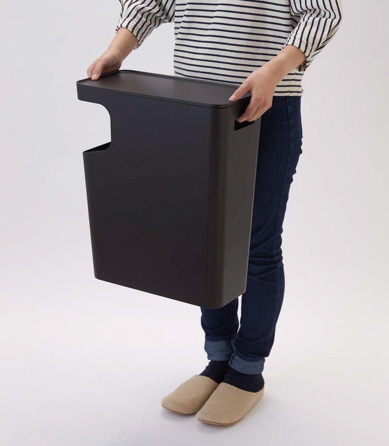 Side view of black Side Table Trash Can on white background by Yamazaki Home.