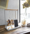 Aerial view of white Undershelf Organizer holding spices in kitchen by Yamazaki Home.