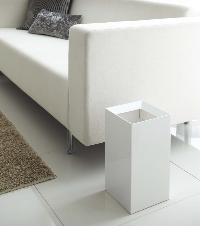 White Grid Panel Organizer on kitchen countertop by Yamazaki Home.