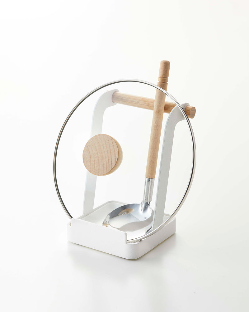 Prop photo showing Lid & Ladle Stand with various props.