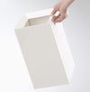 Black Grid Panel Accessory - open shelf displaying Pantry Organizer by Yamazaki Home.
