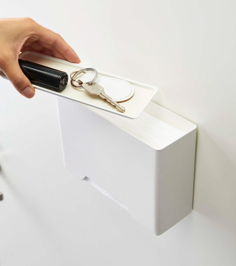 Aerial view of white Face Mask Dispenser holding masks with top removed by Yamazaki Home.
