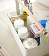 Aerial view of white Storage Caddy holding first-aid materials by Yamazaki Home.
