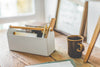White Desk Organizer holding ruler, pens and paper by Yamazaki Home.