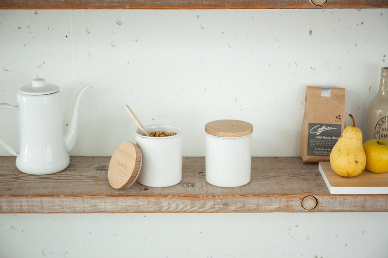 Front view of Ceramic Food Canister on kitchen shelf by Yamazaki Home.