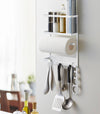 White Magnetic Organizer on kitchen fridge holding kitchen tools by Yamazaki home.
