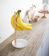 Black Grid Panel Accessory - 5 Hook holding cooking utensils on kitchen countertop by Yamazaki Home.
