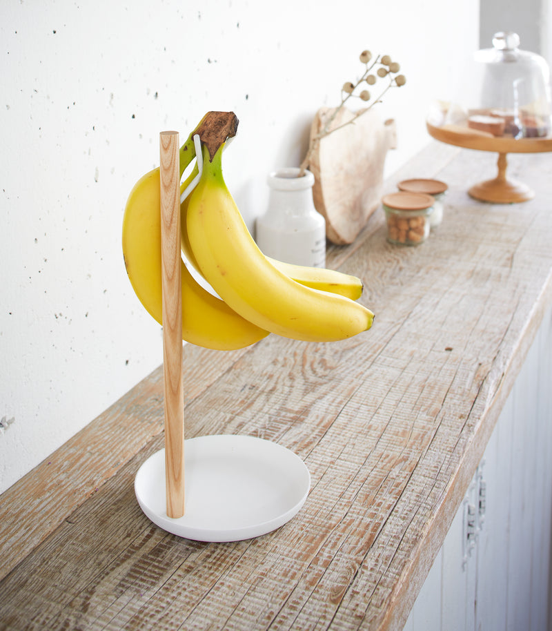 Black Grid Panel Accessory - 5 Hook holding cooking utensils on kitchen countertop by Yamazaki Home.