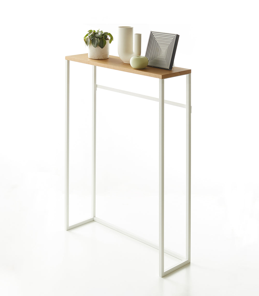 Prop photo showing Narrow Entryway Console Table with various props.