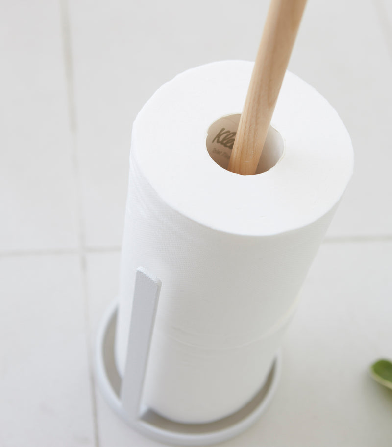 Close up aerial view of Toilet Paper Stocker holding toilet paper rolls on white background by Yamazaki Home.