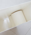 Aerial view inside white Toilet Paper Stocker holding toilet paper rolls by Yamazaki Home.