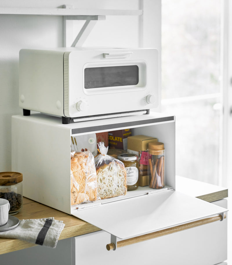 White Bread Box holding bread and food items on countertop by Yamazaki Home.